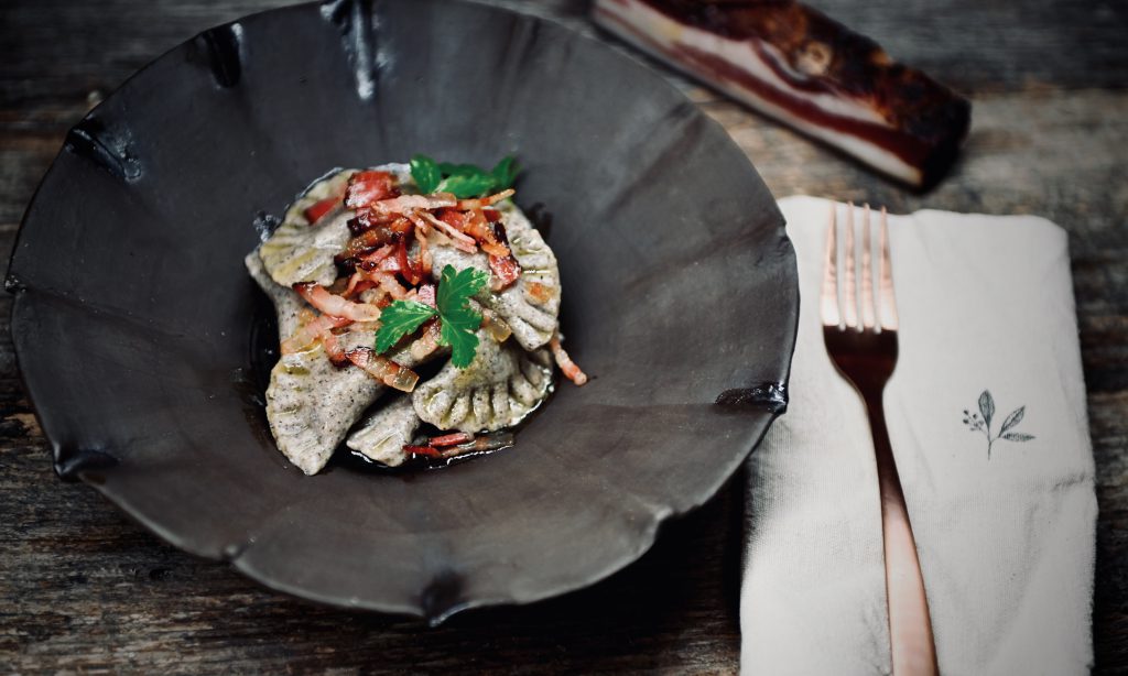 Schlutzkrapfen mit Speck